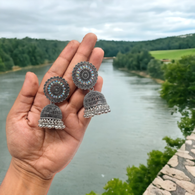 German Silver Coloured stone Flower Design Jhumka || 1 Pair…